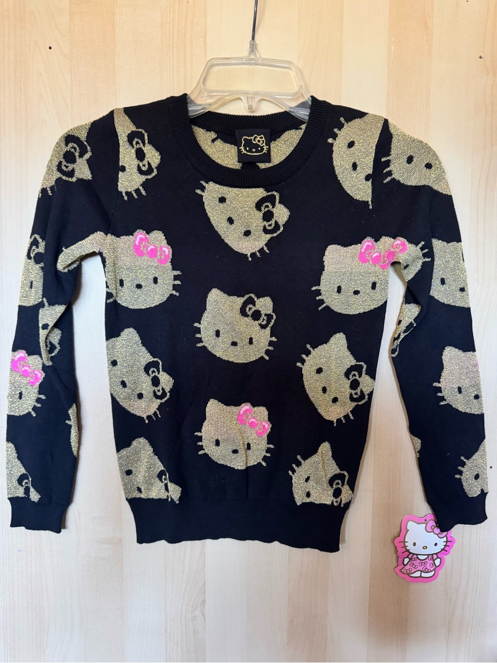 Sanrio Hello Kitty Black Crewneck Sweater with Gold Glitter and Pink Bows